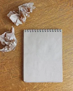 Notebook on table Stock Photos