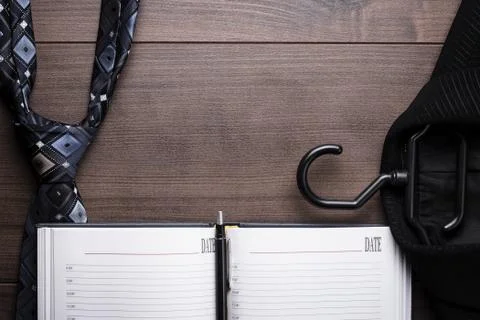 Notebook on the table with suit and tie Stock Photos