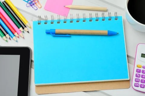 Notebook tablet pc cup coffee on table Stock Photos