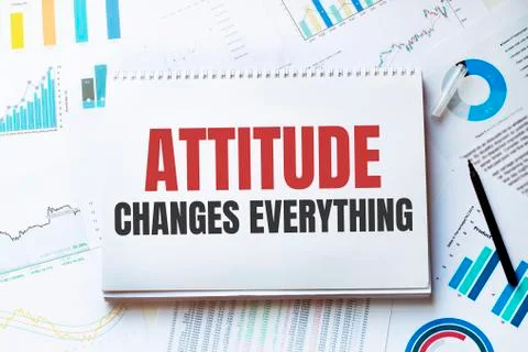 Notebook with Tools and Notes about attitude changes everrything,concept Stock Photos