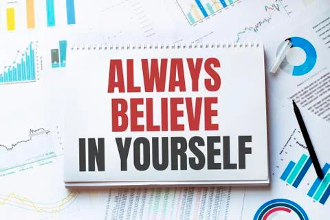 Notebook with Tools and Notes about Always believe in yourself Stock Photos