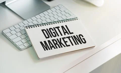 Notebook with Tools and Notes about Digital Marketing, concept Stock Photos