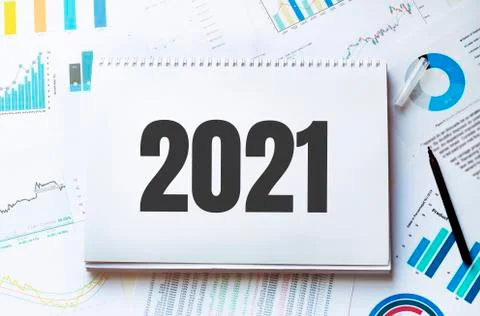 Notebook with Tools and Notes with text 2021 Stock Photos