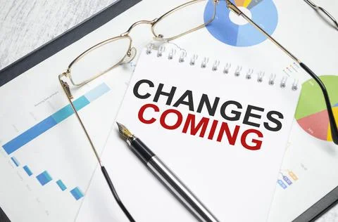 Notebook with Tools and Notes with text change is coming Stock Photos