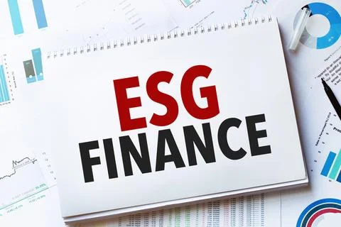 Notebook with Tools and Notes with text esg finance Stock Photos