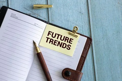 Notebook with Tools and Notes with text FUTURE TRENDS. Stock Photos