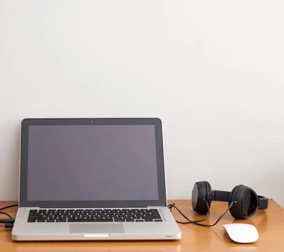 Notebook on top of a home office desk. Copy space. Workspace and technology.  Stock-Fotos