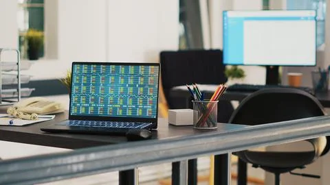 Notebook with trading platform and customers financial consultations list Stock Photos