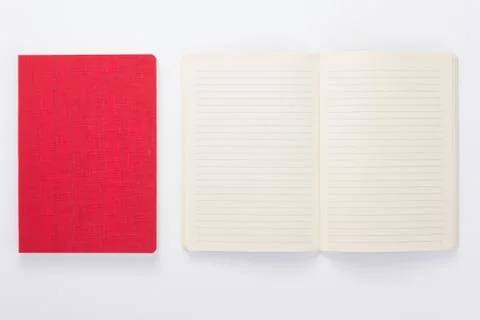 Notebook at white paper background Stock Photos