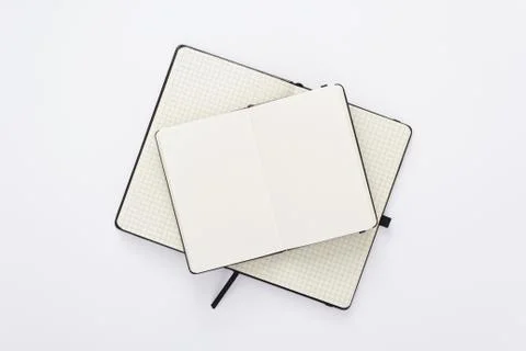 Notebook at white paper background Stock Photos