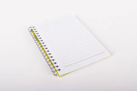 Notebook on white Stock Photos