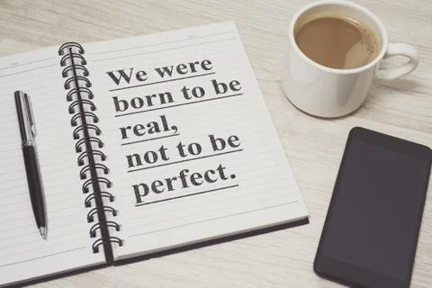 Notebook with wisdom quote Stock Photos