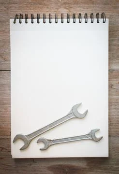 Notebook on the wood background Stock Photos