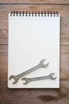 Notebook on the wood background Stock Photos