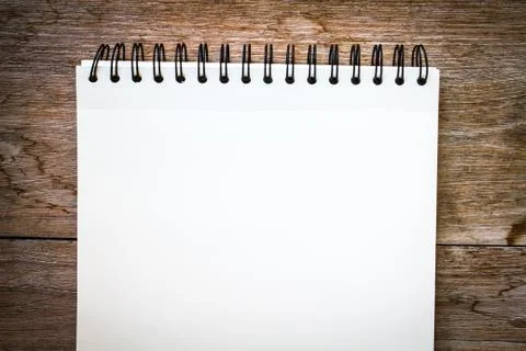 Notebook on the wood background Stock Photos