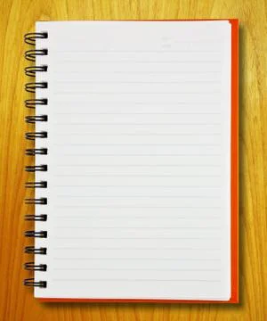 Notebook on wood Stock Photos