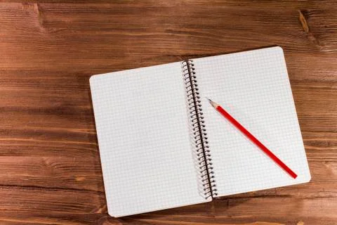 Notebook on wooden background Stock Photos