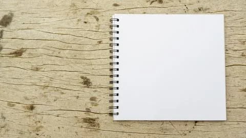 Notebook on a wooden background. Stock Photos