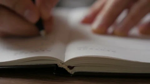 Notebook Writing Stock Footage 168368461