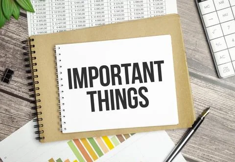 Notebook written with Important Things word on wooden background. Business .. Stock Photos