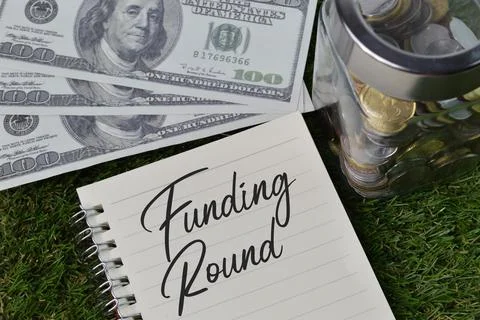 Notebook written with text FUNDING ROUND. Business concept. Stock Photos