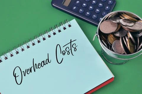 Notebook written with text OVERHEAD COSTS. Business concept. Stock Photos