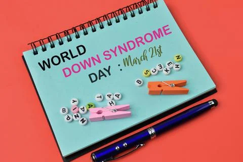Notebook written with text WORLD DOWN SYNDROME DAY on March 21st Stock Photos