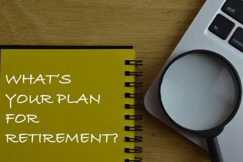 Notebook written with WHAT'S YOUR PLAN FOR RETIREMENT? Stock Photos