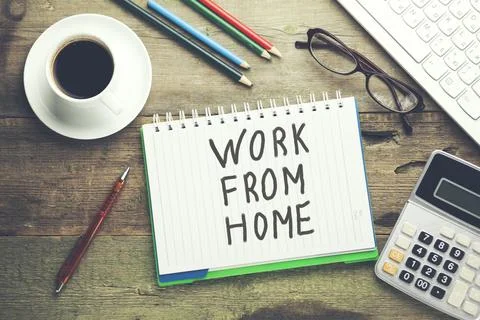 Notebook written work from home text Stock Photos