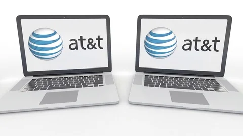 Notebooks with American Telephone and Telegraph Company AT T logo on the screen Stock Footage