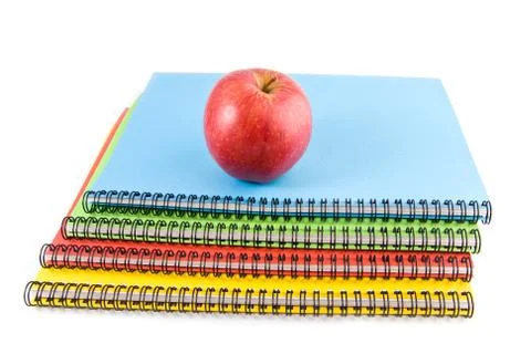 Notebooks and apple Stock Photos