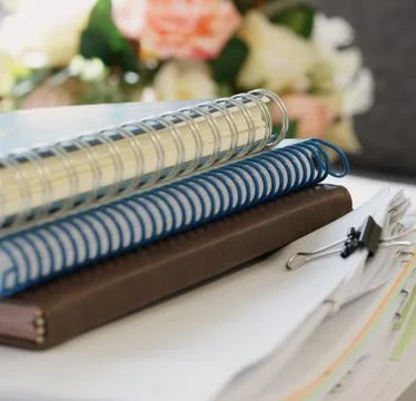 Notebooks and stack of document Stock Photos
