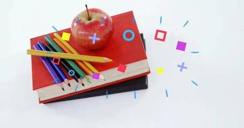 Notebooks apple pencils sitting on white table frames sending shapes passing Stock Footage 331048029