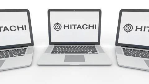 Notebooks with Hitachi logo on the screen. Computer technology conceptual Stock-Illustration