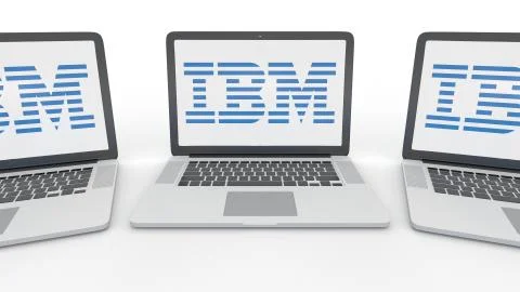 Notebooks with IBM logo on the screen. Computer technology conceptual editorial 스톡 일러스트