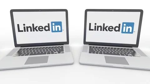 Notebooks with LinkedIn logo on the screen. Computer technology conceptual Stock Footage 73190519