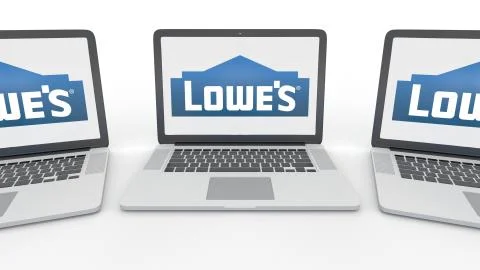 Notebooks with Lowe's logo on the screen. Computer technology conceptual Stock-Illustration