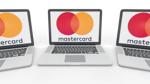 Notebooks with MasterCard logo on the screen. Computer technology conceptual Stock-Illustration