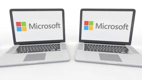 Notebooks with Microsoft logo on the screen. Computer technology conceptual Stock Footage 73169844