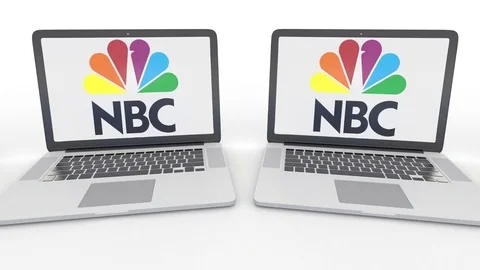 Notebooks with National Broadcasting Company NBC logo on the screen. Computer Stock Footage