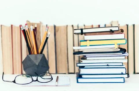 Notebooks piles, stack of books education back to school background, textbook Stock Photos