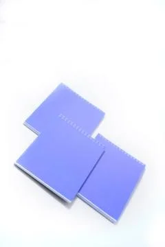 Notebooks on a white background Photos