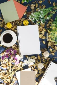 Notepad and coffee on rustic background Stock Photos