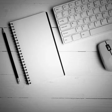 Notepad and computer black and white color style Stock Photos