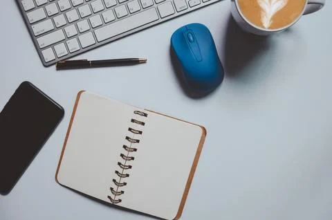 Notepad and computer keyboard 스톡 사진