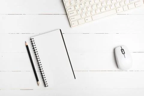 Notepad and computer Stock Photos