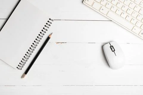 Notepad and computer Stock Photos