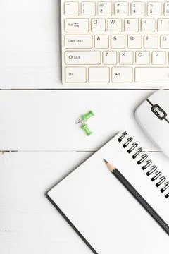 Notepad and computer Stock Photos