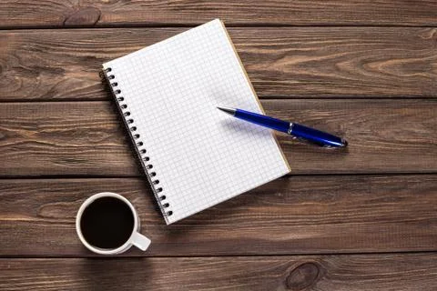 Notepad and pen with coffee. Foto stock