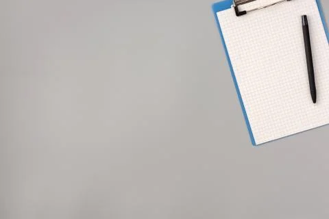 Notepad and pen on gray background, health care concept and prevent the sprea Stock Photos